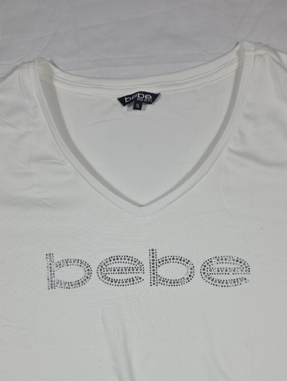 bebe White V-Neck Rhinestone Logo Tee
